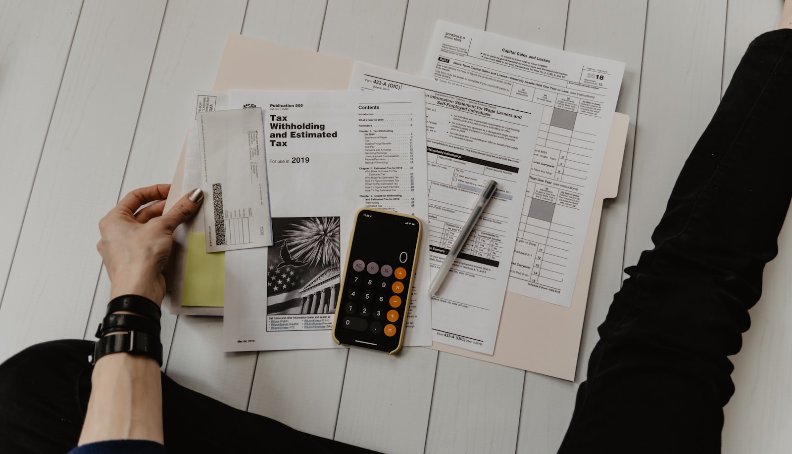 A UK SME valuer cross-referencing EBITDA, DCF and comparable transactions in a working valuation file.